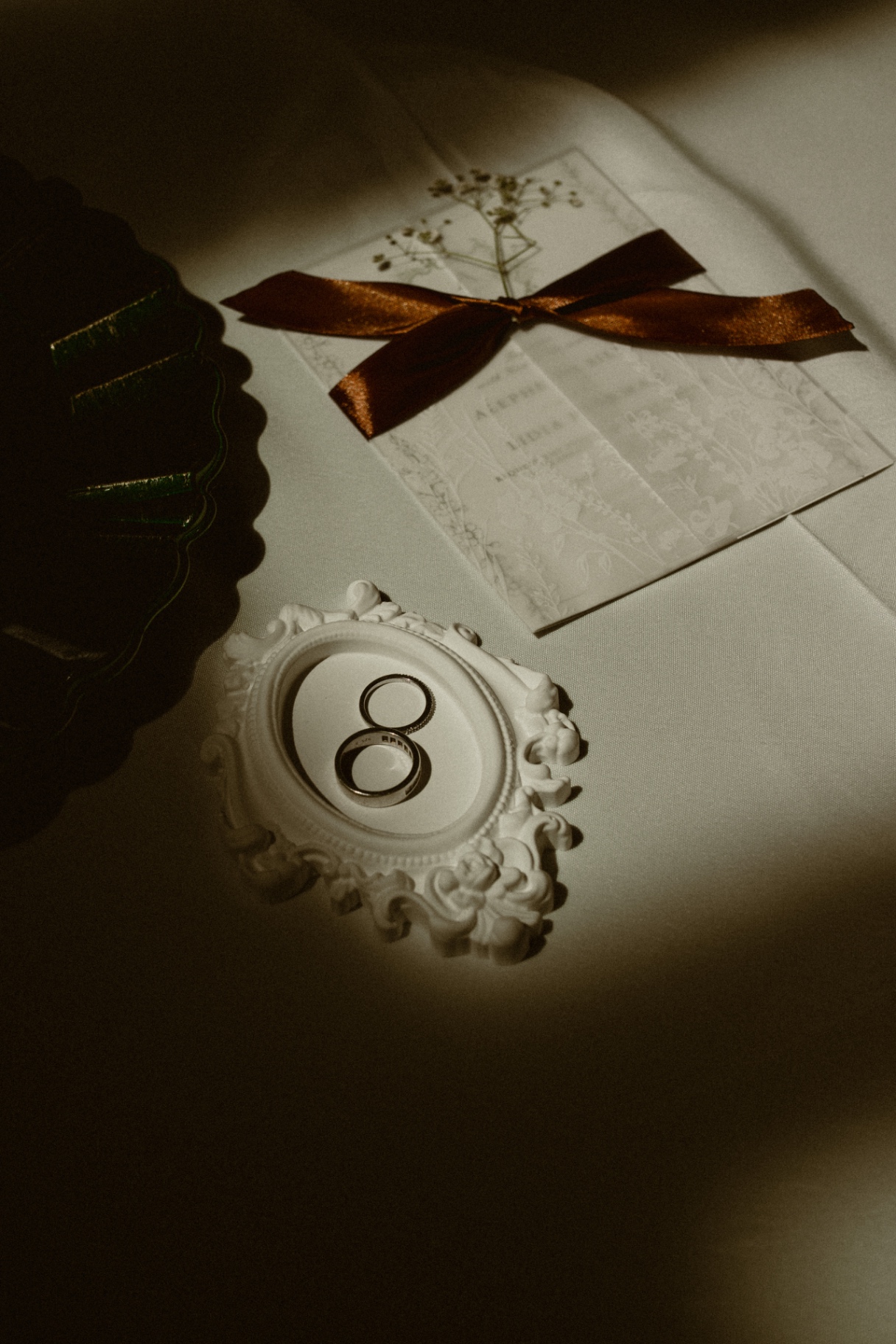 Wedding rings in an ornate frame
